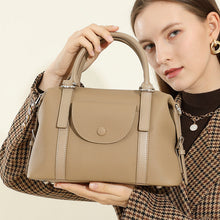 Load image into Gallery viewer, New genuine leather ladies' bag in black with stitching and lock detail, medium hardness, single shoulder strap.Genuine Leather Ladies' Bags