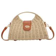 Load image into Gallery viewer, Women's medium straw bucket handbag in beige and khaki with locking buckle closure and crossbody strap
